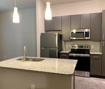 mela luxury apartments model kitchen